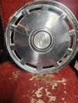 Single 1983-1986 Mercury Grand Marquis 14" Hubcap Wheel Cover. Fixed Price $35.00.