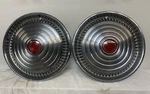 (2) 1970 1971 1972 Pontiac Grand Prix Wheel Covers 15". Fixed Price $29.99.