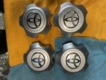 42603-48020 Toyota Highlander Hubcap Center Set Silver Or Dark Charcoal. Fixed Price $75.00.
