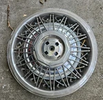 1975-1985 Cadillac Deville Seville Fleetwood 15" Wire Hubcap Wheel Covers. Fixed Price $125.00.