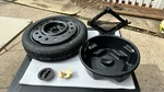 2000-03 Buick Lesabre Spare Tire T125/70R16 Jack, Insert, Hold Down Set Kit 16X4. Fixed Price $174.95.