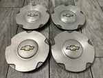 4 02-06 Chevy Trailblazer 16 Wheel Center Hubcaps 9593378. Fixed Price $49.99.