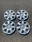 Factory Toyota Camry 15 Inch Hubcaps Wheel Covers Scratched 42621-AA080. Fixed Price $72.00.