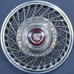 One 1986-1988 Cadillac Deville / Eldorado Seville # 2050B 14" Wire Wheel Cover. Fixed Price $129.99.