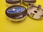 Set Of 4 Subaru Black/blue Wheel Center Cap, 28821SA030. Fixed Price $29.86.