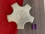 #h (1) 1997 -2000 Toyota Camry Alloy Wheel Center Cap 42603-AA010. Fixed Price $19.95.