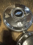 Chevy Dog Dish Of Caps 10 1/2. Fixed Price $90.00.