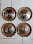 Set 4 Hot Rod Rat Rusty Patina Wheel Covers Hub Caps 1957 Plymouth Style 15". Fixed Price $76.00.
