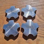Jeep Grand Cherokee Center Cap Set Of 4, 2001-2004 P/n 5HF45TRMAA. Fixed Price $129.95.
