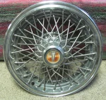 1977-87 Pontiac Lemans Grand Prix Bonneville Wire Hub Cap. Fixed Price $30.00.