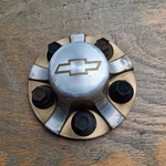 Chevy Blazer, S-10 Center Cap, Two Tone, 1994-2005 Part # 15731941 01 G. Fixed Price $69.95.