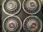 Cadillac Set Of 4: 15 Inch. Fixed Price $85.00.