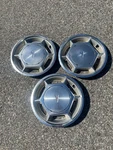 Factory 1975 1980 Pontiac Sunbird Astre 13 Inch Hubcaps Wheel Covers. Fixed Price $28.00.
