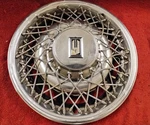 Oldsmobile Toronado : 1980, 1981, 1982, 1983, 1984, 1985, 15" Oem Hub Cap, #754. Fixed Price $60.00.