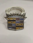 1975-1985 Cadillac Wire Wheel Cover Crest Emblem With Clip P# 254508 Replacement. Fixed Price $20.90.