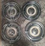 1958 Oldsmobile 14" Set Of Wheel Covers Cream Centers. Fixed Price $90.00.