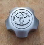 Toyota Highlander Center Cap, 2003-2006, Part Number PPE+PA6 Repainted. Fixed Price $29.95.