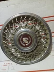 One 1985 To 1987 Cadillac Deville Locking 14 Inch Wire Spoke Hubcap. Fixed Price $66.75.