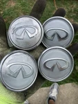 Infiniti Oem Rim Center Caps. Fixed Price $20.00.