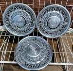 1975-1979 Cadillac Fleetwood Brougham 15" Wire Spoke Hubcap Wheel Covers (3). Fixed Price $175.00.