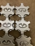01-03 Infiniti QX4 Repainted Silver Center Hubcap 40342-3W700 Set Of 4PCS. Fixed Price $42.00.