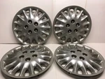 Oldsmobile Cutlass Chevrolet Monte Carlo Gm 10249516 16" Hubcaps Silver Plastic. Fixed Price $53.95.