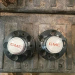 2 Gmc 5 Bolt Rally Wheel Hubcaps. Fixed Price $29.99.