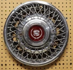 (1) 1981-1985 Cadillac Eldorado, Seville 15-INCH Wire Spoke Hubcap Part# 1623577. Fixed Price $25.95.