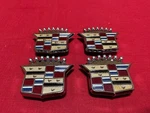 Nos Set Of Cadillac Hubcap Emblems / Covers Gm 354570. Fixed Price $300.00.