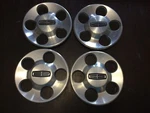 Set Of 4-2000-02 Lincoln Center Caps, #3369. Fixed Price $48.00.