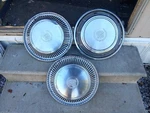 Three 1971 Cadillac Cady Eldorado Fleetwood Hubcaps Wheel Covers Vintage. Fixed Price $130.00.