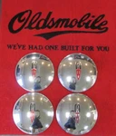 1941 90 Series & 1942 Oldsmobile Dog Dish Poverty Center Cap Set # 916491. Fixed Price $179.00.