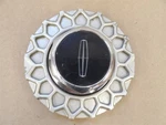 Lincoln Continental 1995-1997 Center Cap For 15X6-1/2 Aluminum Wheel Lacy Spokes. Fixed Price $30.00.