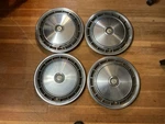 Set Of Four, 1977-79 Chrysler 15 Hubcaps #393-B. Fixed Price $85.00.