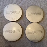 Ford Taurus Sho Center Caps Early 90S FODC-1A096-DA. Fixed Price $15.00.