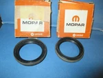 Mopar Front Wheel Hub Dust SEALS(2)N.O.S. 72-76 Challenger,cuda,charger,runner,c. Fixed Price $15.00.