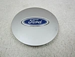 1986 1992 Ford Taurus Oem Polycast Wheel Center Cap E7DC-1A096-AA #2E-3. Fixed Price $10.00.