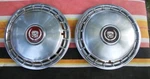 1985-88 Cadillac Deville Fleetwood Pair Oem 14" Wheel Covers Red Centers Nice!. Fixed Price $50.00.