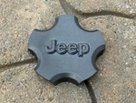 Jeep Cherokee Grand Oem Wheel Center Cap Dark Gray 5HF52TRMAA 2000-2005. Fixed Price $13.95.
