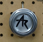 American Racing # 10837 Custom Silver Center Cap (qty. 1). Fixed Price $15.95.