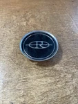 1980-1985 Buick Riviera Wire Hubcap Center Emblem Cover 25504363. Fixed Price $11.70.