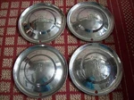 1953 Plymouth Set Of Four 15" Hubcaps. Fixed Price $60.00.