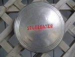 One 10.5 In. Studebaker Commander Champion Sarliner Starlight Hubcap Wheel Cover. Fixed Price $137.50.
