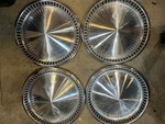 1957 Plymouth Hubcaps Set Of 4. Fixed Price $75.00.