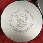 Cadillac Center Cap N.o.s. New Gm Painted Silver Part #3544650 /6 1/2 In. Across. Fixed Price $13.00.