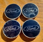 Ford Taurus Center Cap Set Of 4, 2010-2012 Part # 97BG 1000 Ad. Fixed Price $69.95.