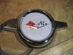 Chevy Corvette?? Camaro?? Checkered Flag Emblem With Chrome Ring 9756542. Fixed Price $60.00.