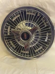 1966 Oldsmobile Cutlass Wire Spoke Spinner Hubcap. Fixed Price $50.00.