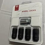 Tesla Wheel Locks 1023981-01-A Chrome Black Nip. Fixed Price $115.00.