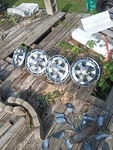 Chevrolet Vintage 14" Spinner Hubcaps Bow Tie Colors. Fixed Price $175.00.
